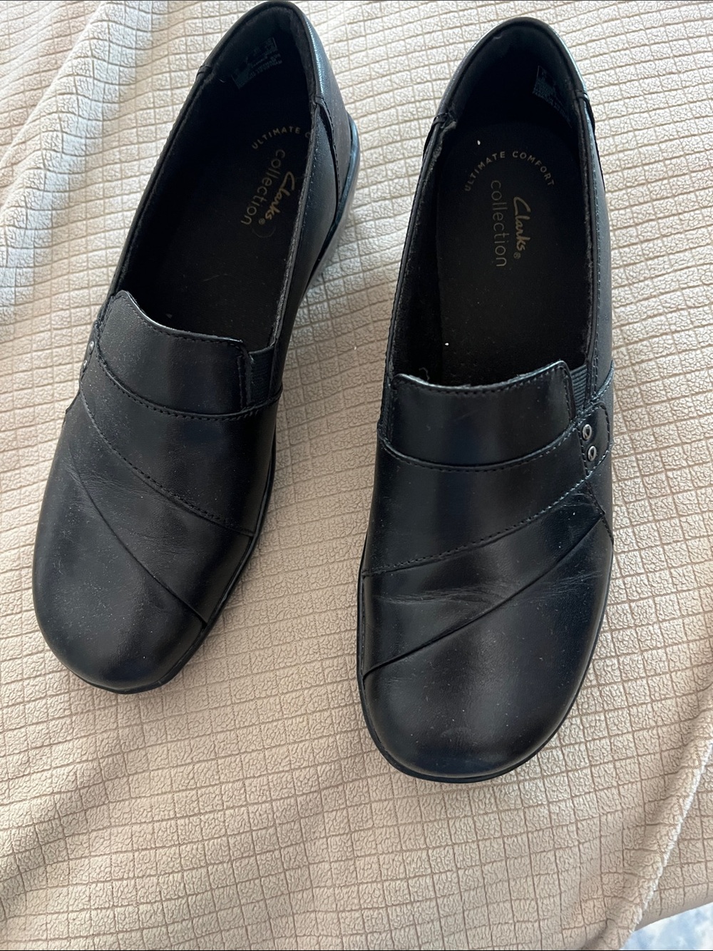 Clarks Black Slip-On Comfort Loafers.
Worn one time. Very comfortable.